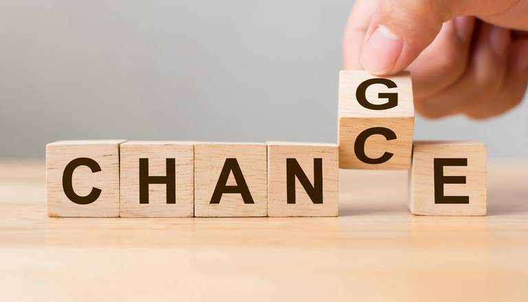 Small wooden blocks displaying the word Chance is changing to Change