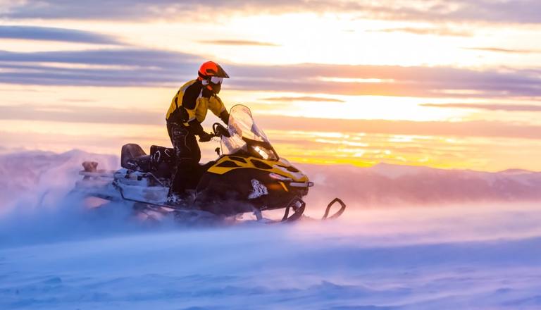 man-stops-to-fill-up-snowmobile-wins-big