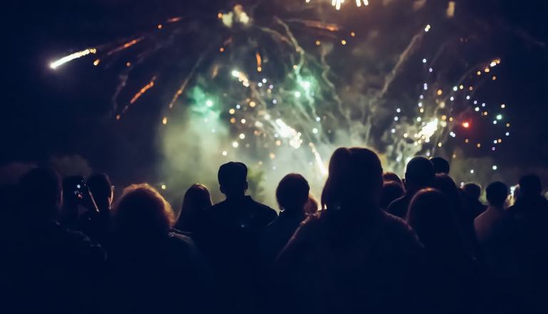 Crowd watching fireworks in celebration