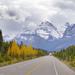 Landscape shot of a scenic Canadian route with highway, mountains and foliage Thumbnail